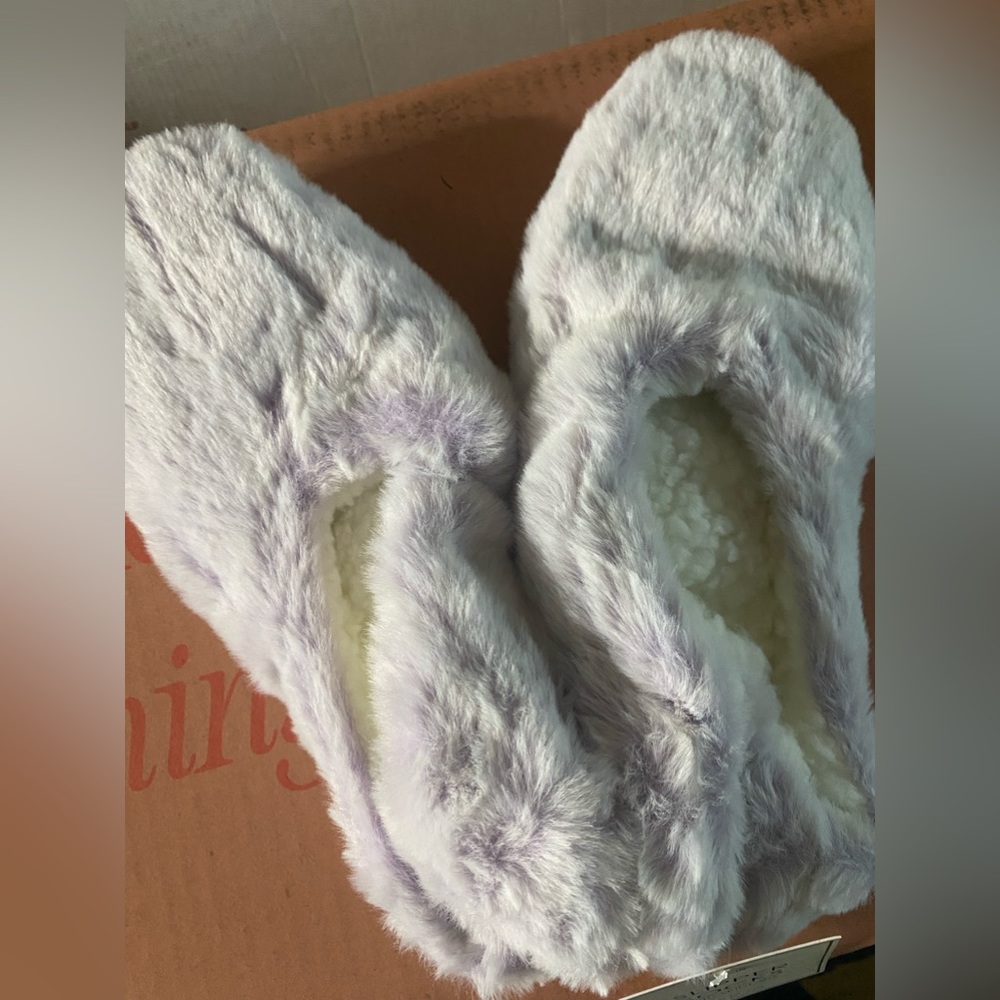 NWT Lavender Slippers with Grippers. Very soft Sherpa inside.